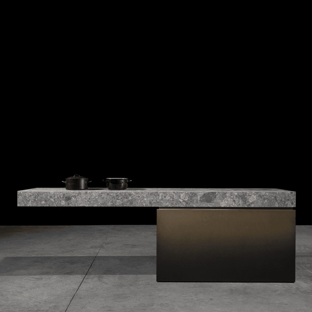 Marble and dark-toned kitchen island detail, designed by colorlab.